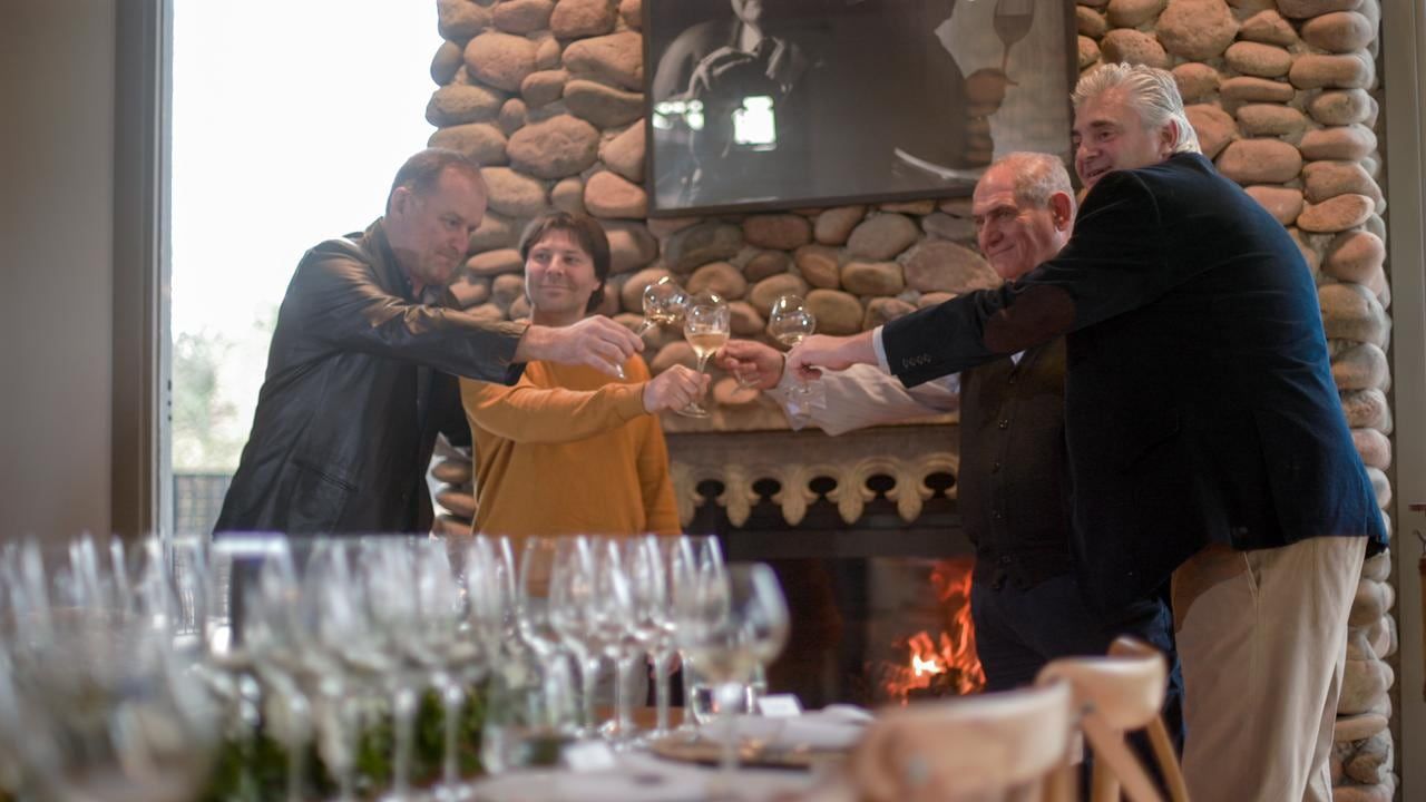 Pablo Glöggler, Eduardo Stradella, Raúl Bianchi y Silvio Alberto en la presentación de las nuevas añadas de la bodegas. - Gentileza