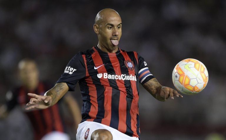 San Lorenzo's midfielder Juan Mercier gestures during their Recopa Sudamericana 2015 first final football match against River Plate at the Monumental stadium in Buenos Aires, Argentina, on February 6, 2015. AFP PHOTO / Juan Mabromata buenos aires Juan Mercier futbol recopa sudamericana 2015 futbol futbolistas partido river plate vs san lorenzo