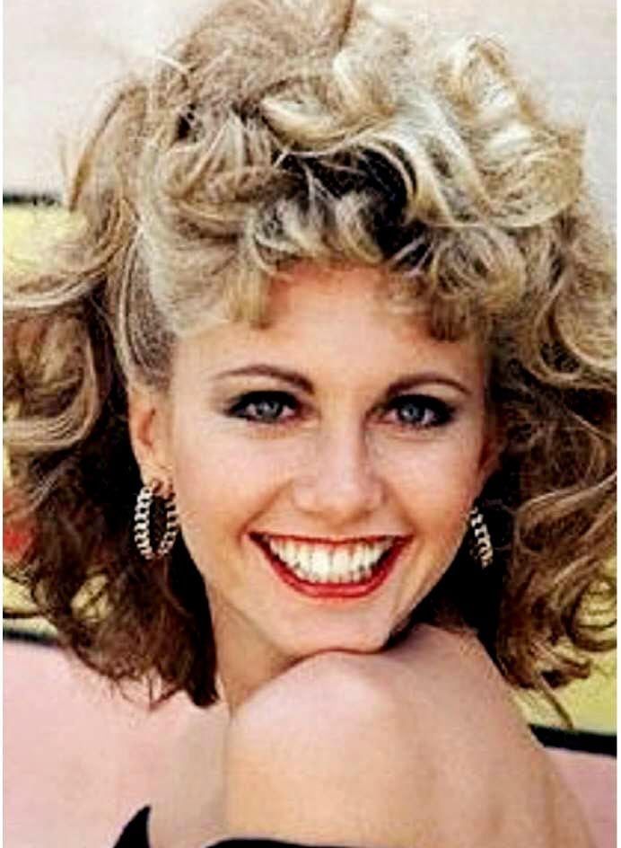 
    Olivia Newton-John. En su época de súper éxito en Hollywood.
   