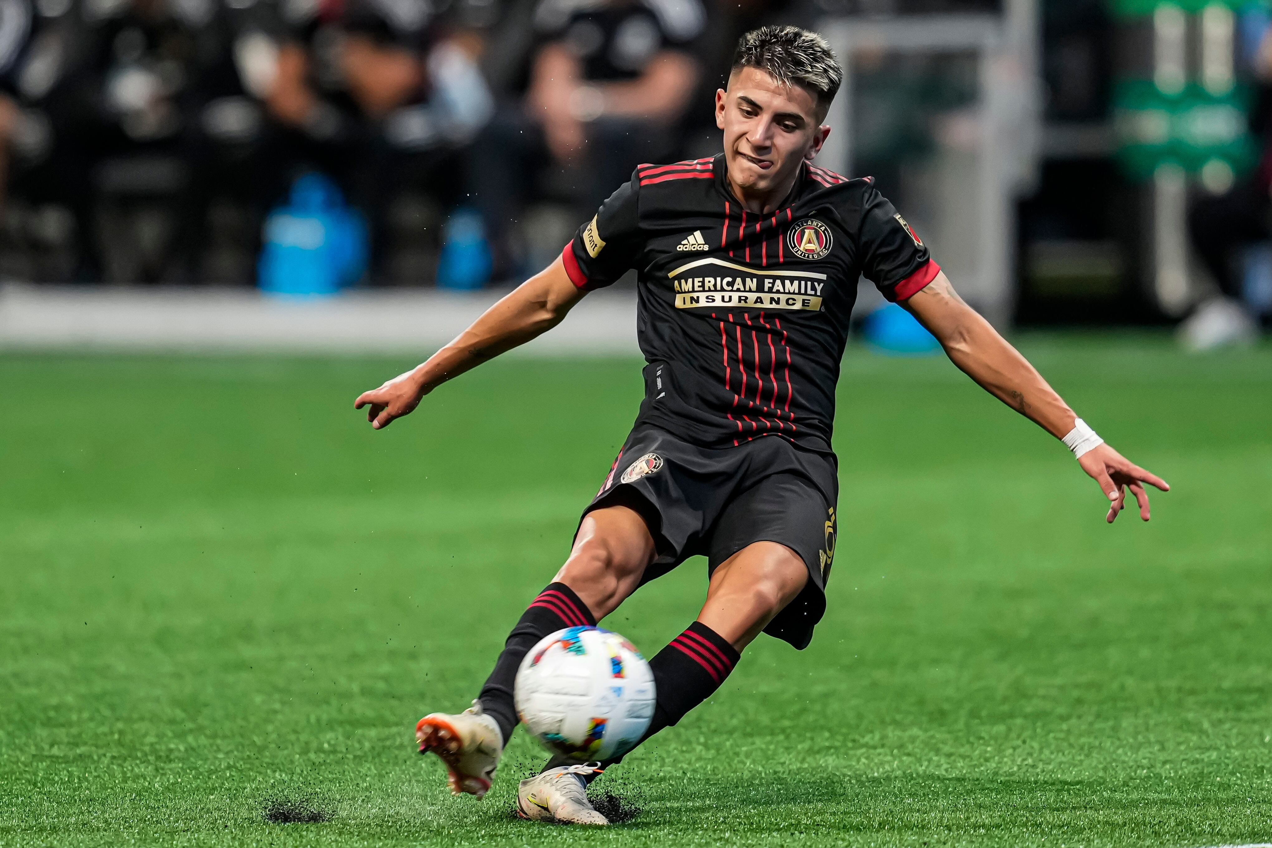 Mar 19, 2022; Atlanta, Georgia, USA; Atlanta United midfielder Thiago Almada (8) scores a goal against the CF Montréal during the second half at Mercedes-Benz Stadium. Mandatory Credit: Dale Zanine-USA TODAY Sports