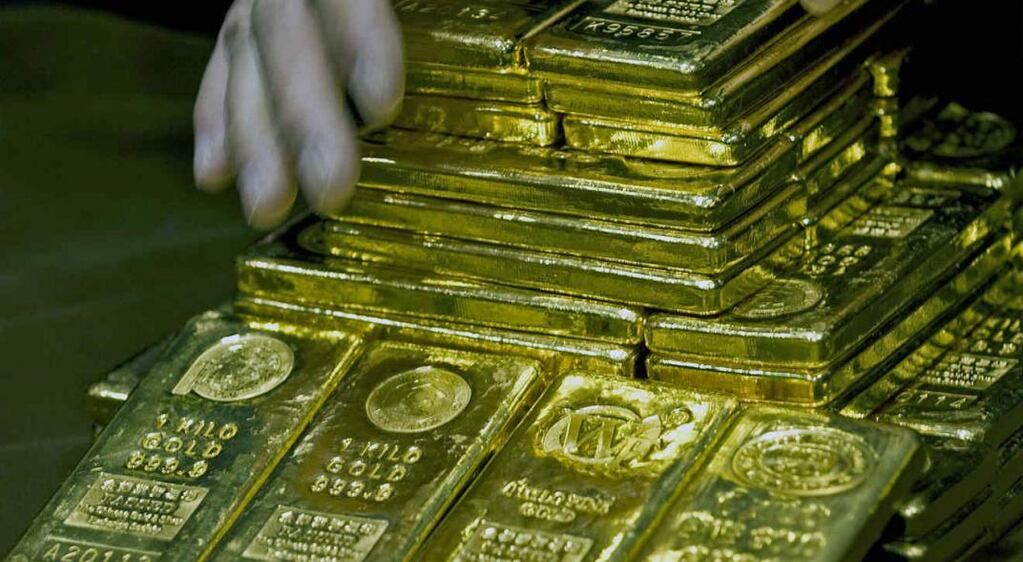 Lingotes. Aunque es lo tradicional, no se recomienda invertir en activos físicos de oro. (AP)
