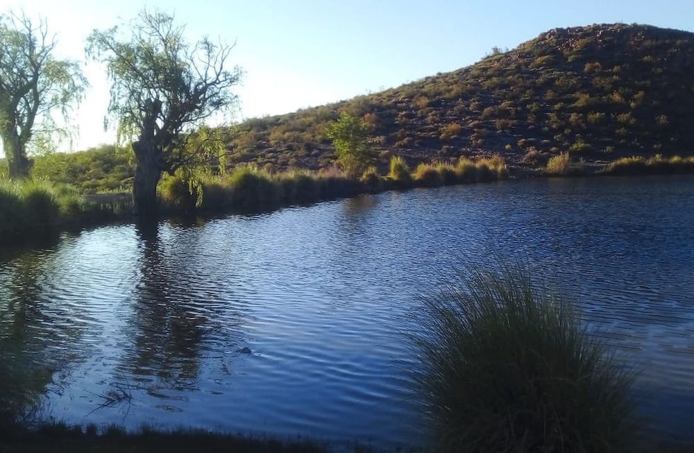 Una laguna de aguas claras es uno de los principales atractivos de Agua Escondida. Su mayor problema es la conectividad.
