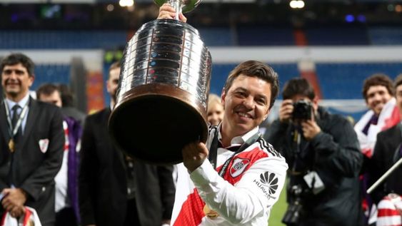 Soccer Football - Copa Libertadores Final - Second Leg - River Plate v Boca Juniors - Santiago Bernabeu, Madrid, Spain - December 9, 2018  River Plate coach Marcelo Gallardo celebrates with the trophy after winning the Copa Libertadores final    REUTERS/Sergio Perez