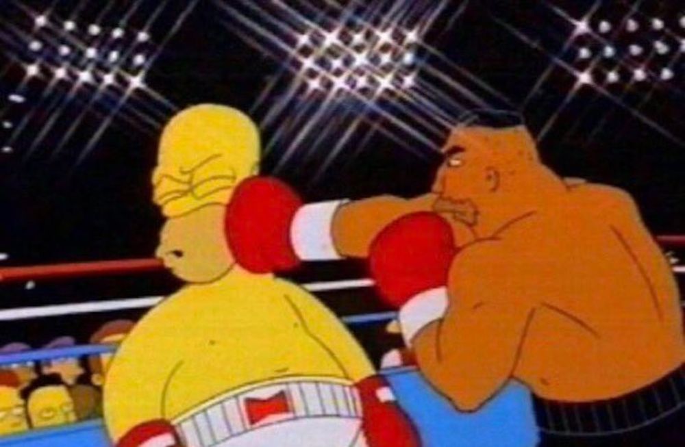 Logan Paul recibe de Mayweather como Homero de Tayson.