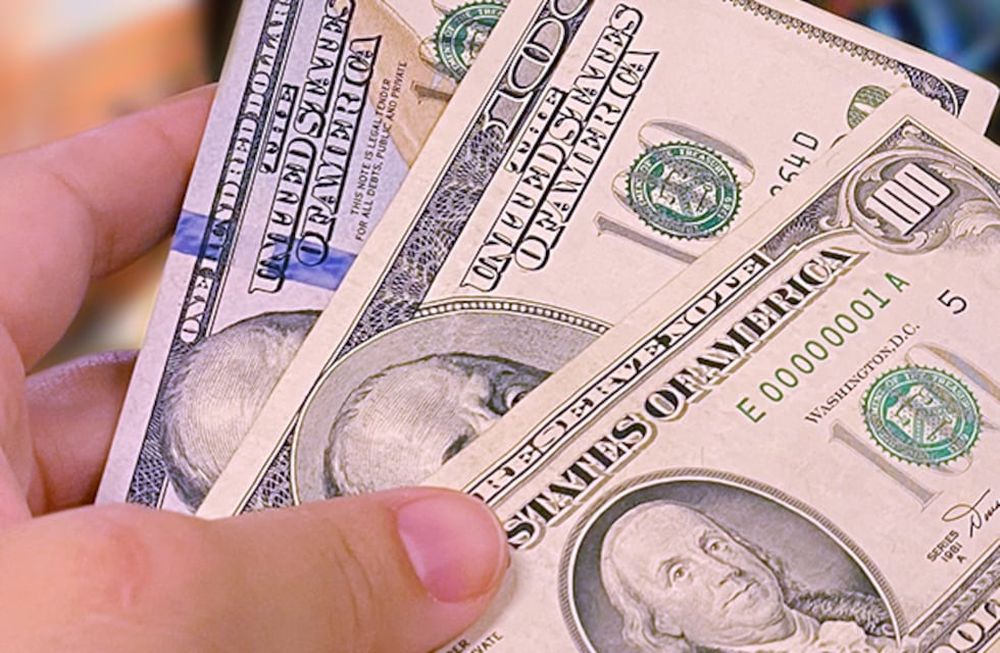 Dólar cara chica y dólar cara grande.
