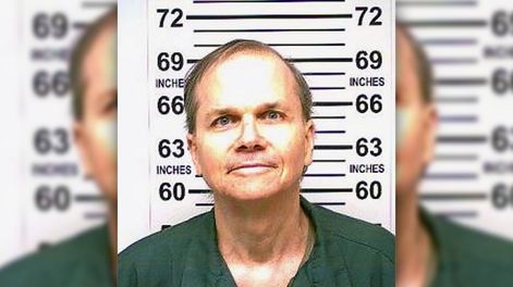 FILE — This Jan. 31, 2018 photo, provided by the New York State Department of Corrections, shows Mark David Chapman, the man who killed John Lennon. Chapman, 65, was denied parole for an 11th time, New York state corrections officials said Wednesday, Aug. 26, 2020. (New York State Department of Corrections via AP, File)
