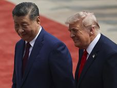 Donald Trump junto a Xi Jinping