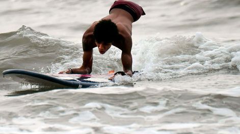 Fotogalería: la conmovedora historia del venezolano sin piernas que se luce en el surf