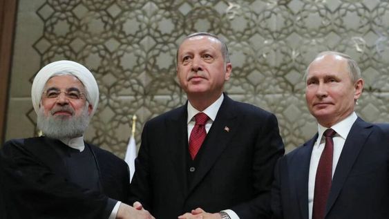El presidente iraní, Hasan Rohaní, y sus homólogos turco, Recep Tayyip Erdogan, y ruso, Vladímir Putin.