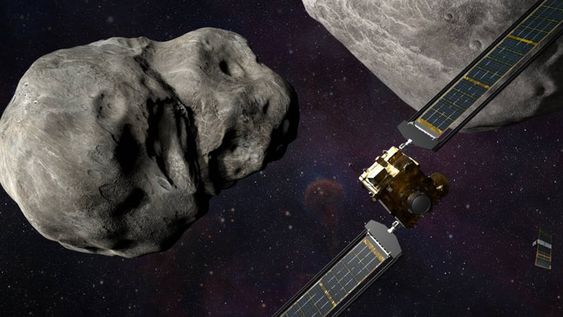 Ilustración de la nave espacial DART de la NASA y del LICIACube de la Agencia Espacial Italiana antes del impacto con el sistema binario Didymos.
