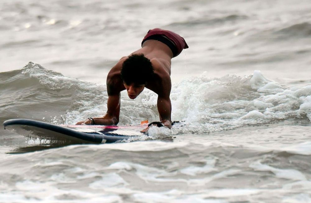 Fotogalería: la conmovedora historia del venezolano sin piernas que se luce en el surf