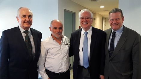 Jueces y médicos en  un coloquio