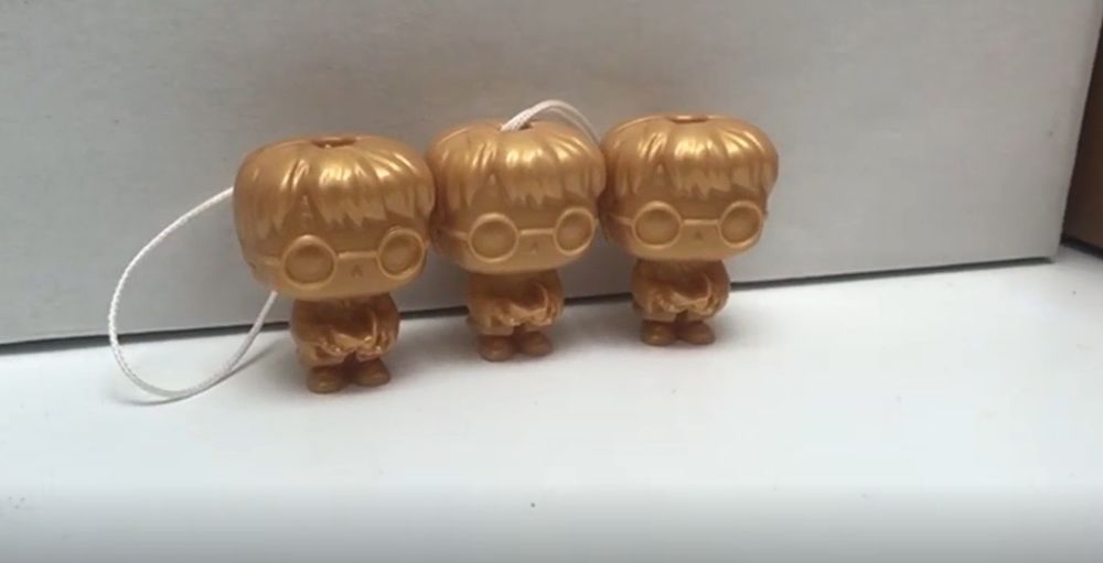 Tres Funkos dorados de Harry Potter&nbsp;