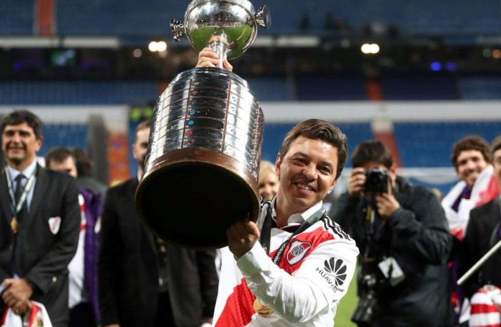 Soccer Football - Copa Libertadores Final - Second Leg - River Plate v Boca Juniors - Santiago Bernabeu, Madrid, Spain - December 9, 2018  River Plate coach Marcelo Gallardo celebrates with the trophy after winning the Copa Libertadores final    REUTERS/Sergio Perez
