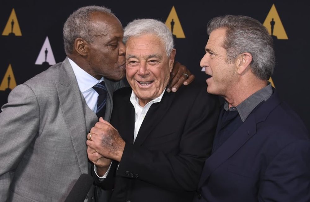 Arma mortal. Danny Glover, Richard Donner y Mel Gibson en el año 2017. Foto: Gentileza