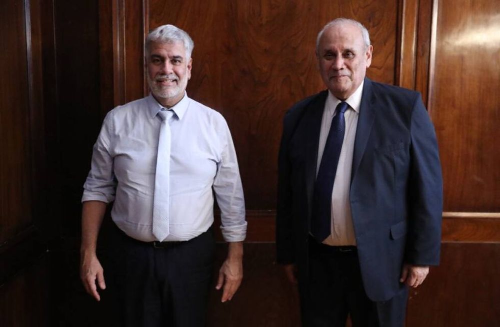 El titular de la Secretaría de Comercio Interior, Roberto Feletti y el Síndico General de la Nación, Carlos Montero.