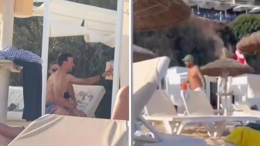 El divertido encuentro de Lionel Scaloni con hinchas argentinos en la playa: look animal print y un trago de regalo