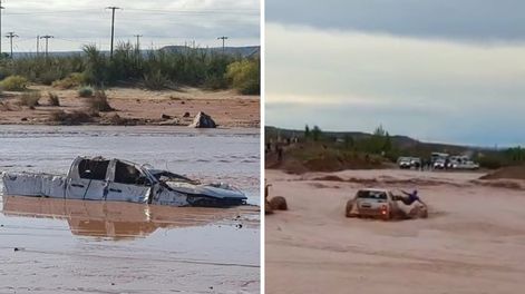 Dos trabajadores fueron rescatados con una máquina de la crecida de un río.