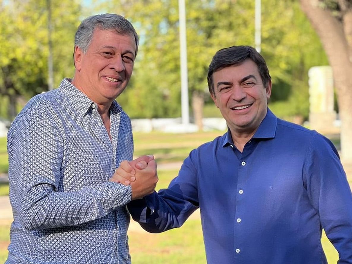 Orozco junto a Omar de Marchi, en el anuncio de la fórmula.