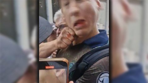 Joven acusado de ser infiltrado en la marcha.