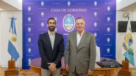El ministro de Hacienda, Víctor Fayad, junto a Daniel Tillard, presidente del Banco Nación.