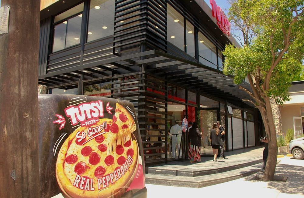 Tutsy Pizza ¡porciones gratis para todos!
