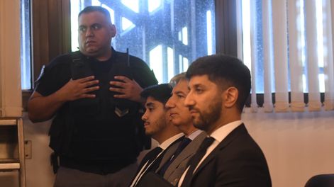 El exjuez Walter Bento y sus dos hijos Nahuel y Luciano. Archivo Los Andes