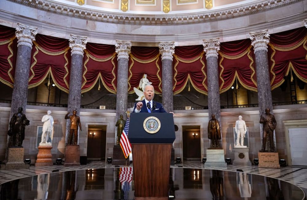 WASHINGTON, DC - JANUARY 06: U.S. President Joe Biden delivers remarks on the one year anniversary of the January 6 attack on the U.S. Capitol, during a ceremony in Statuary Hall at the U.S. Capitol on January 06, 2022 in Washington, DC. One year ago, supporters of President Donald Trump attacked the U.S. Capitol Building in an attempt to disrupt a congressional vote to confirm the electoral college win for Joe Biden. (Photo by Drew Angerer/Getty Images)