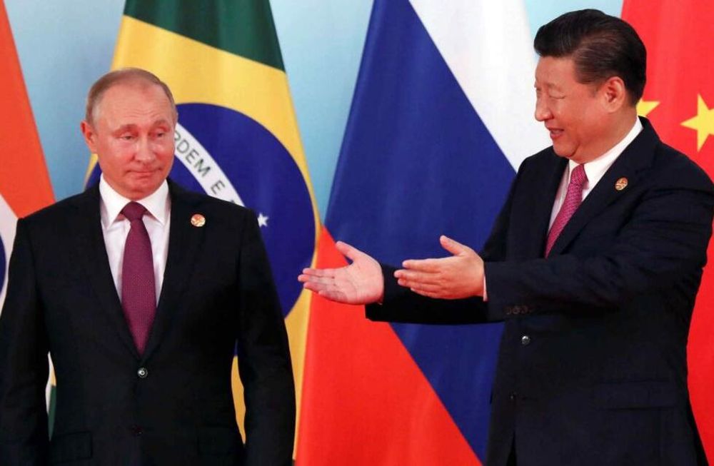 Vladimir Putin y Xi Jinping