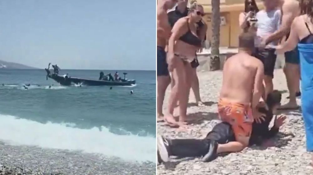 España: Inmigrantes ilegales desembarcaron en una playa, intentaron escabullirse y fueron atrapados por los bañistas.