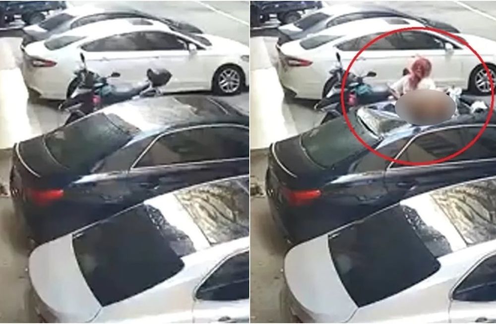 Las cámaras de seguridad del edificio capturaron el momento exacto en el que la mujer cae sobre el techo de un vehículo estacionado y afortunadamente sobrevive.